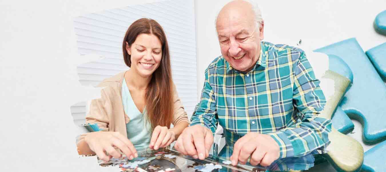 father and daughter with jigsaw puzzle 